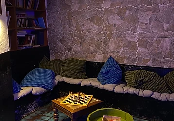 Corner with chessboard and purple light