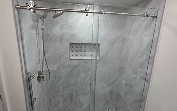 From Studs to Glass: A Custom Marble-Look Shower Remodel in Largo, FL