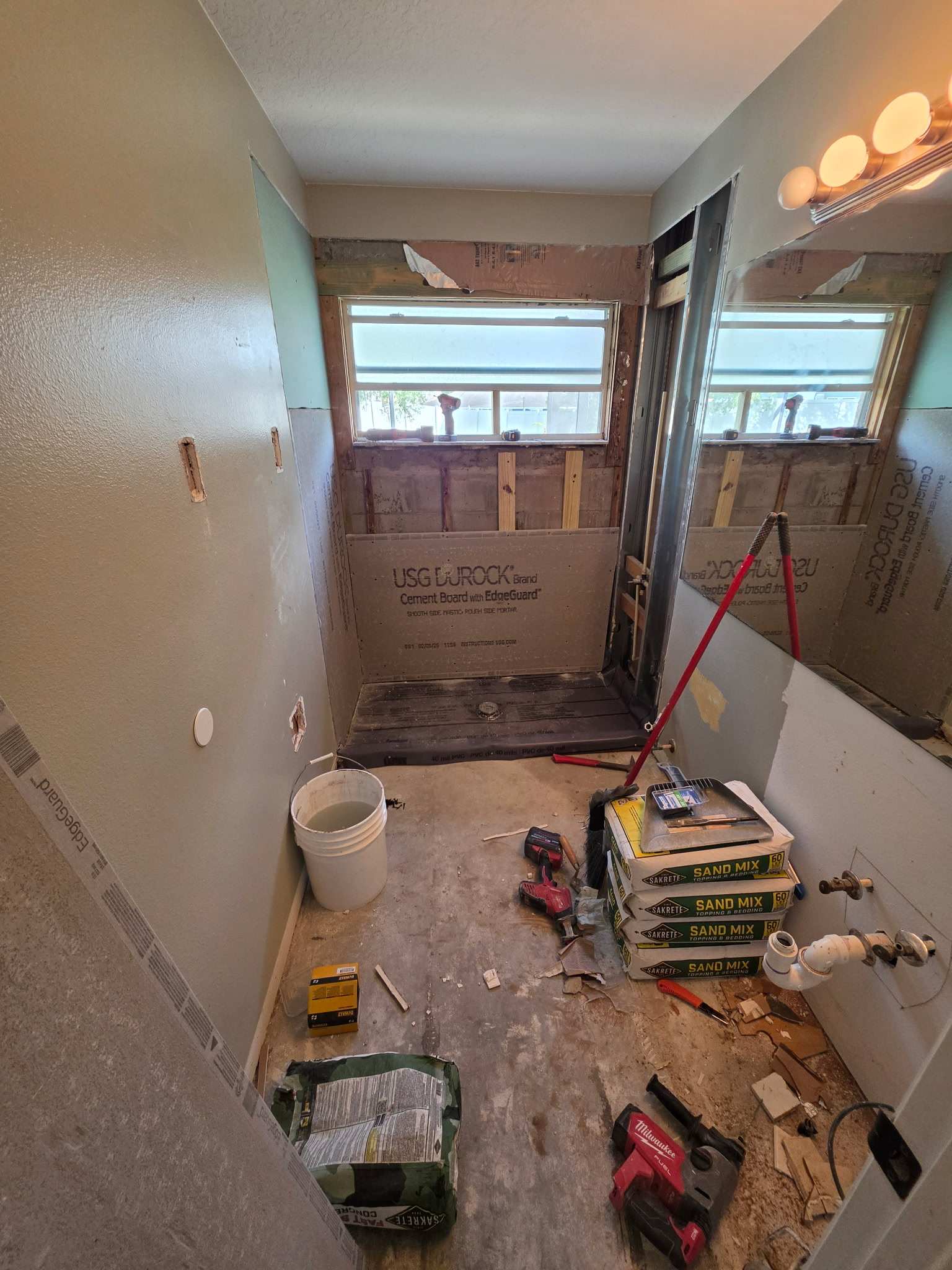 Bathroom renovation demolition and shower preparation by Dream Tiles Inc. in Largo FL.