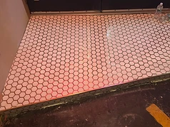 Hexagon mosaic tile installed on a commercial entryway and vertical face in Largo, FL
