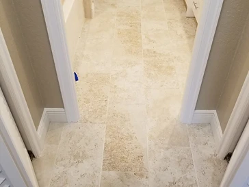 Travertine Bathroom & Pebble Shower — photo 1