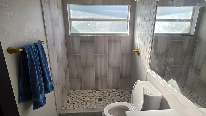 Bathroom Remodel in Largo, FL: Custom Walk-In Shower Transformation by Dream Tiles Inc.