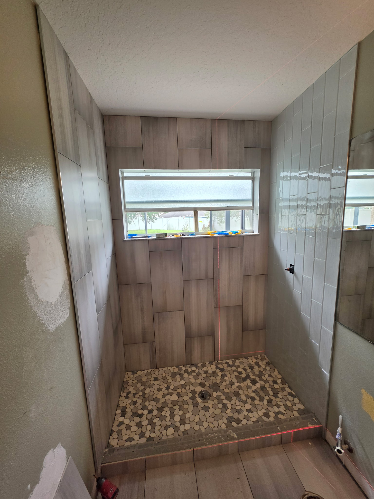 Custom walk-in tile shower installation in Largo Florida by Dream Tiles Inc.