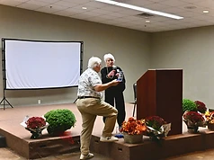 Award presentation on the reunion stage