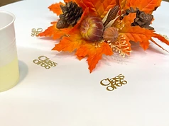 Autumn centerpiece with Class of '66 gold confetti