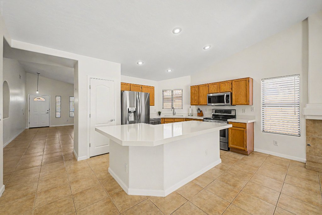 Kitchen island view looking out to the backyard