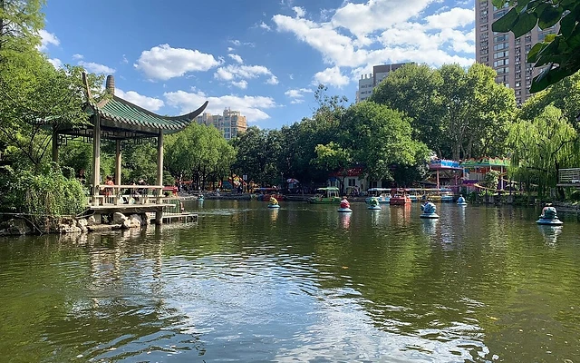The boating lake at Lu Xun Park with its traditional pavilion