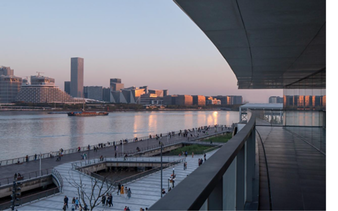 West Bund at dusk — a terrace view over the river