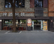 Beer Lady on Suzhou Creek — hundreds of self-service fridges and riverside benches, open 24/7.