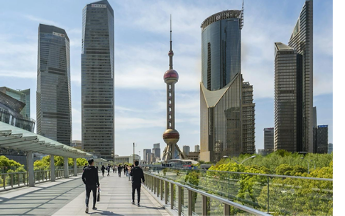 The Lujiazui skyline — the Oriental Pearl Tower rising over Pudong