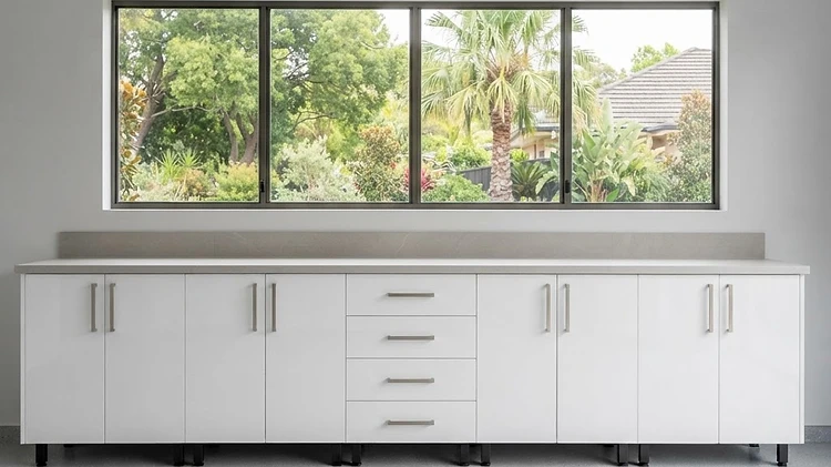 ALUNIQ all-weather cabinets in a wide garage configuration