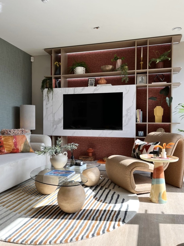 Signature Media Wall — Marble TV recess with full-height shelving