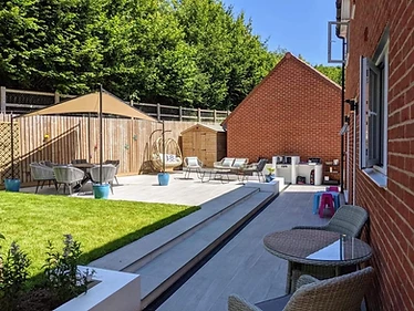 Exterior porcelain patio & lawn with outdoor living area