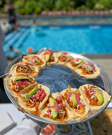 Private party taco catering with al pastor tacos outdoors