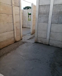 Instalación de paneles prefabricados en muros divisorios en Rivas