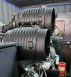 Generator enclosure interior lined with acoustic foam panels