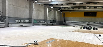 Brušenje parketa in sanacija počenih deščic Stožice