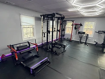 GMWD power cage with bench and accessory wall in the private gym