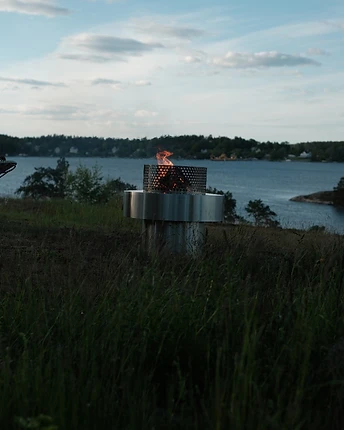 The Fireplace in a Scandinavian garden at dusk