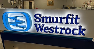 Illuminated 3D channel-letter Smurfit Westrock sign built by Five-O Graphics