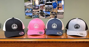Custom embroidered Crooked Creek Metal snapback hats by Five-O Graphics