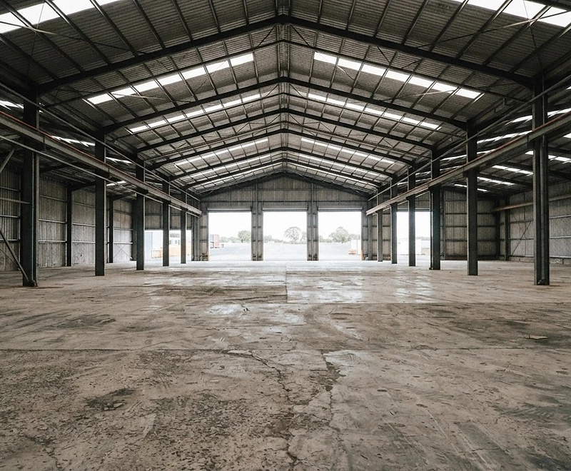 Empty industrial shed before transformation