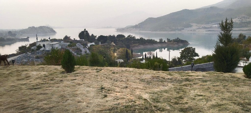 Garden grounds and terraced lawns at Hideout by Lake
