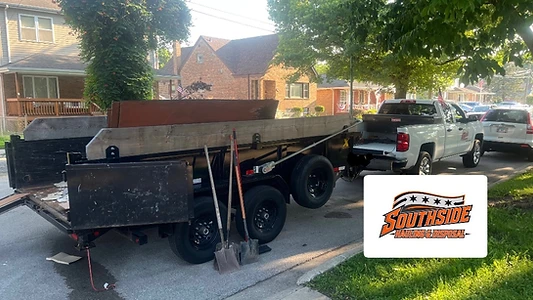 Matte black hauling truck on a Chicago South Side street
