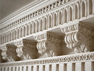 Restored ornate plaster cornice and frieze within a historic Stroud mill boardroom