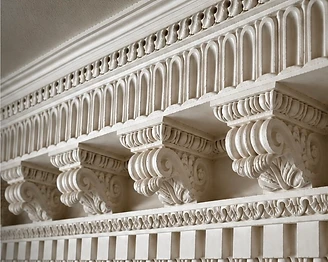 Restored ornate plaster cornice and frieze within a historic Stroud mill boardroom
