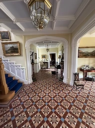 The completed reception hall with coffered fibrous plaster ceiling, fluted columns and encaustic tiled flooring