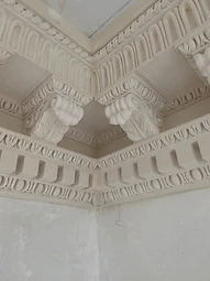 The restored decorative plaster cornice meeting seamlessly at an internal corner of the completed boardroom
