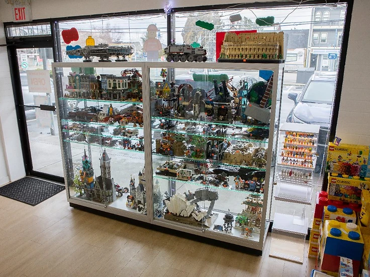 LEGO display case with retired collector sets