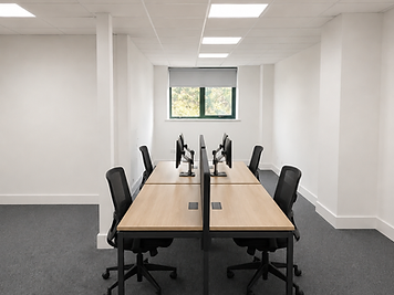 Private office suite with ergonomic seating and monitor arms