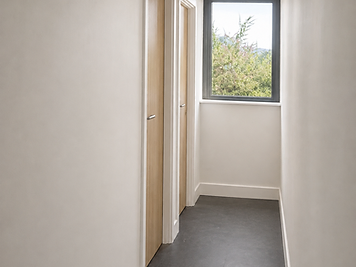 Secure internal corridor leading to private office suites