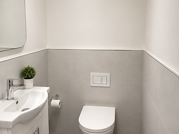 Contemporary WC with premium white-gloss vanity and chrome fittings