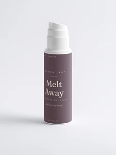Melt Away oil-to-milk cleanser bottle on plum backdrop with milky texture swirl