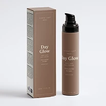 Day Glow anti-age day cream bottle and carton on warm brown backdrop