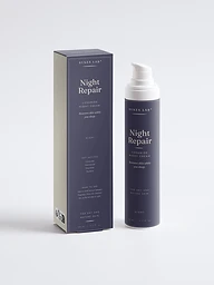 Night Repair ceramide night cream bottle and carton on deep indigo backdrop, night mood