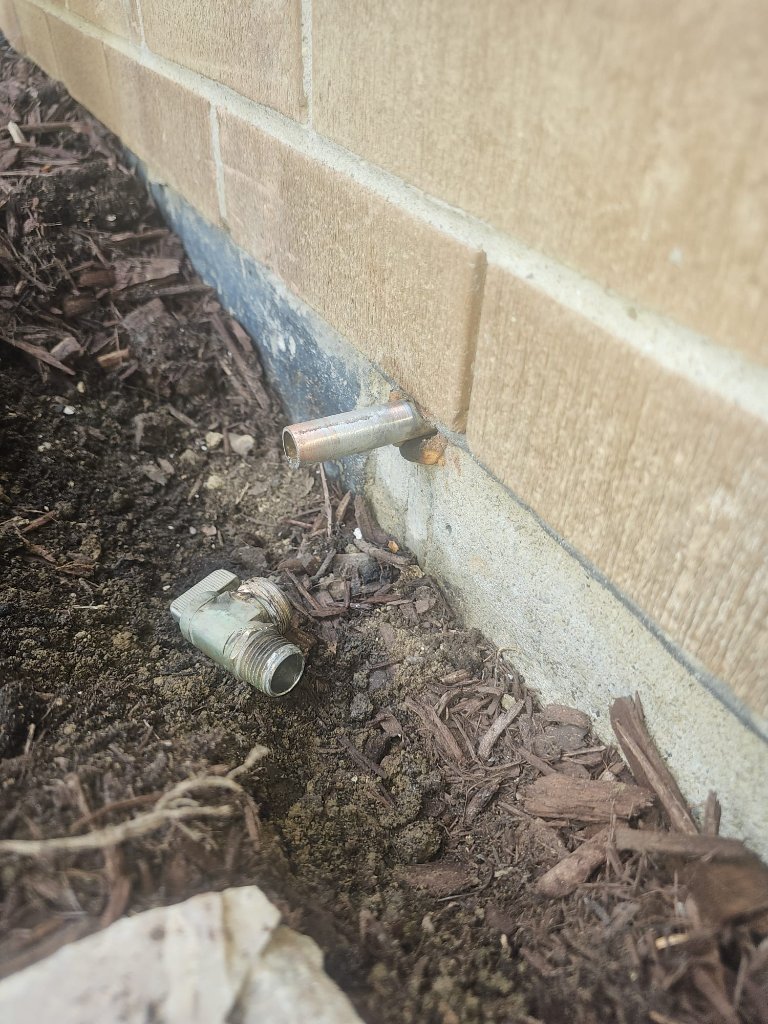 Exterior hose bib removal and replacement with a new anti-siphon valve.