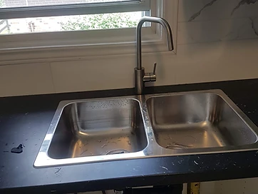 Finished kitchen sink installation with new faucet, Brantford / Woodstock / Niagara plumber