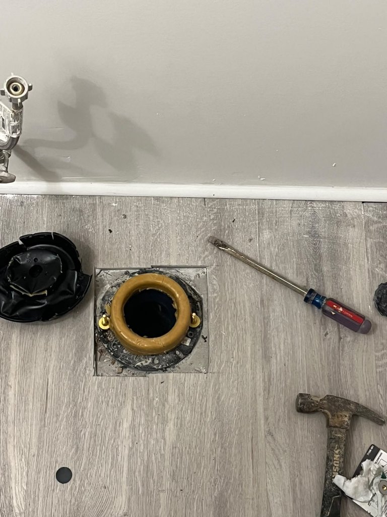 Completed basement floor drain repair, real client project.