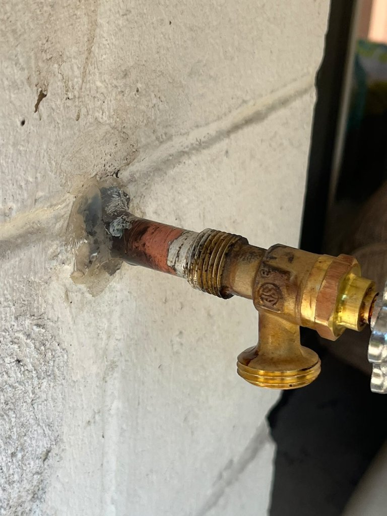 Camera inspection of a cracked PVC sewer line, before drain-stack repair.