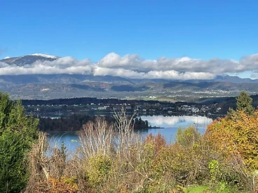 Scenic lake and snow-capped mountains