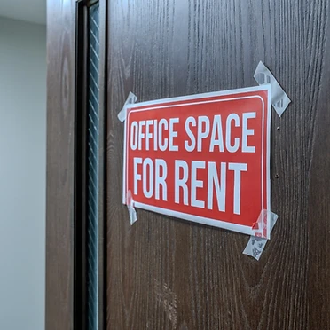 Wood office door with available signage