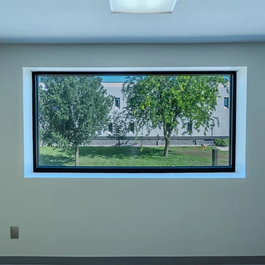 Office window with natural light and exterior view
