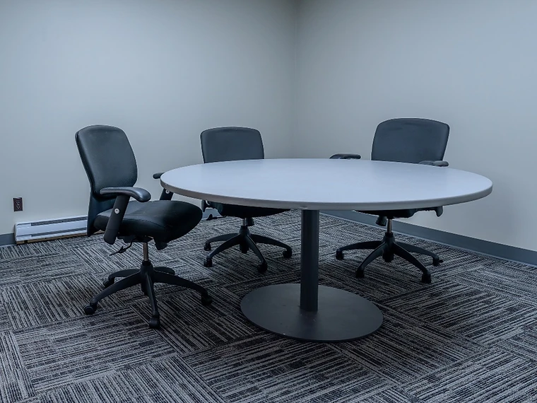 Conference room with circular meeting table