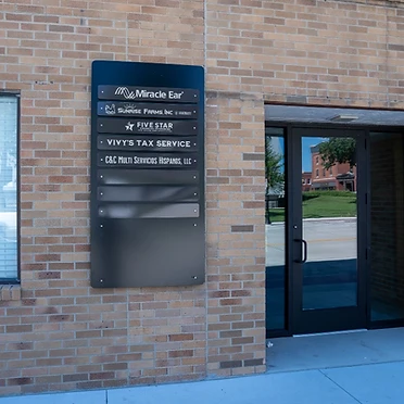 Tenant directory close-up at the building entrance