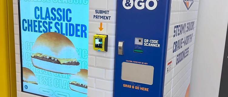 White Castle Crave & Go automated kiosk with touchscreen ordering, payment terminal and grab-and-go dispensing slot