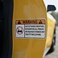 Sticker on yellow sports car door jamb